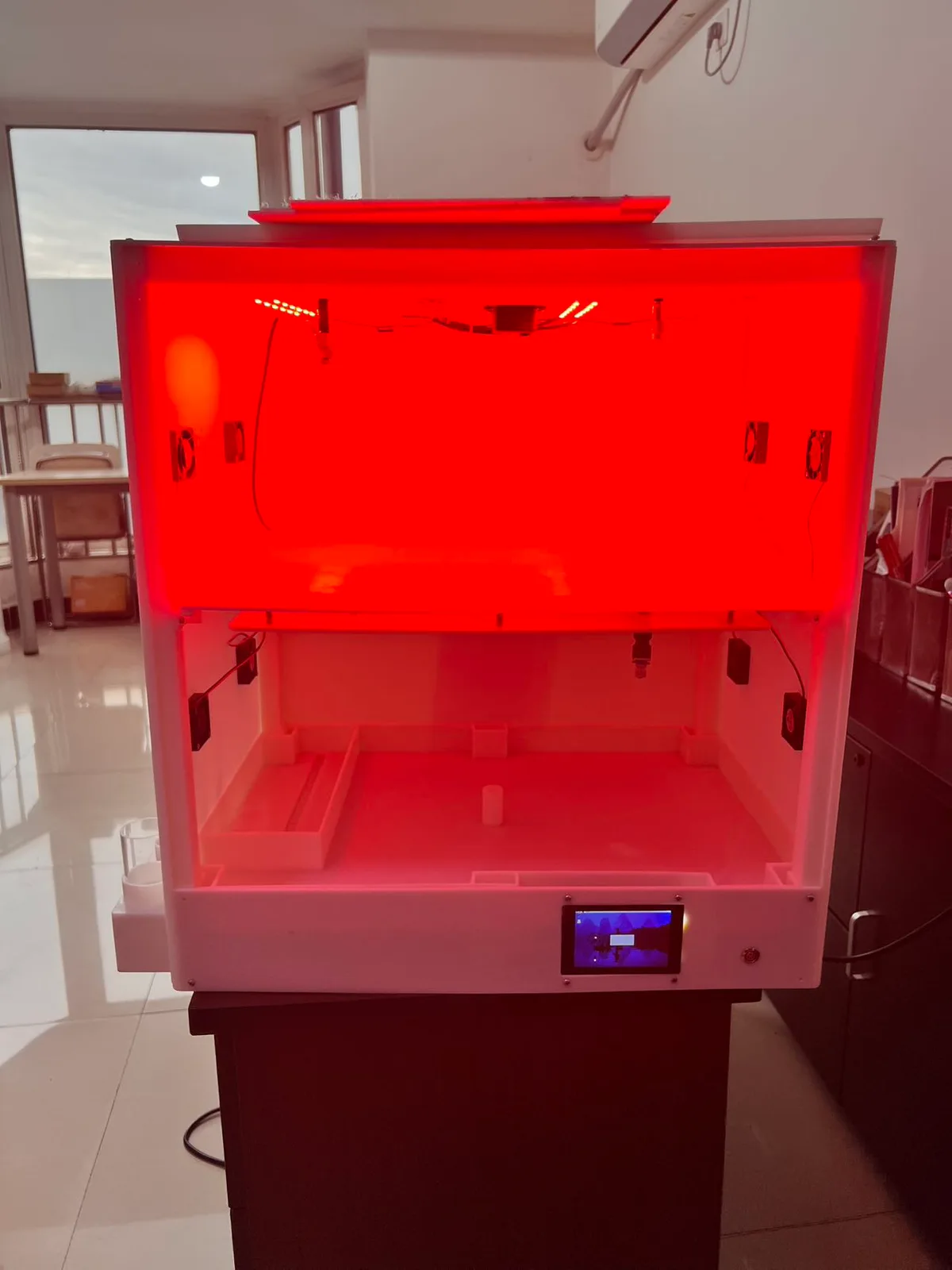 Early prototype under red LED light