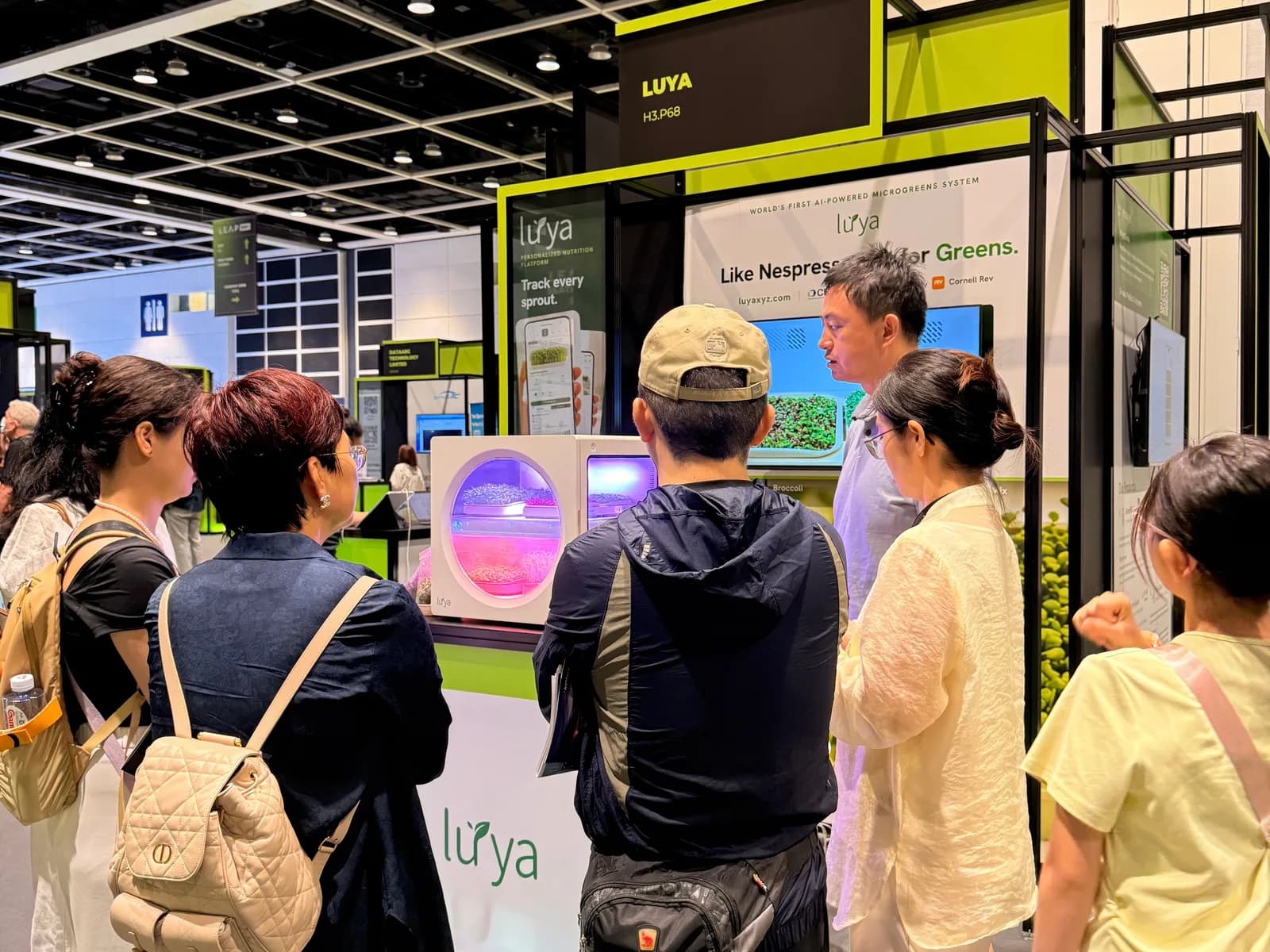 Visitors at the LUYA stand at Leap East, Hong Kong